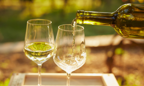 Wine glasses containing white wines